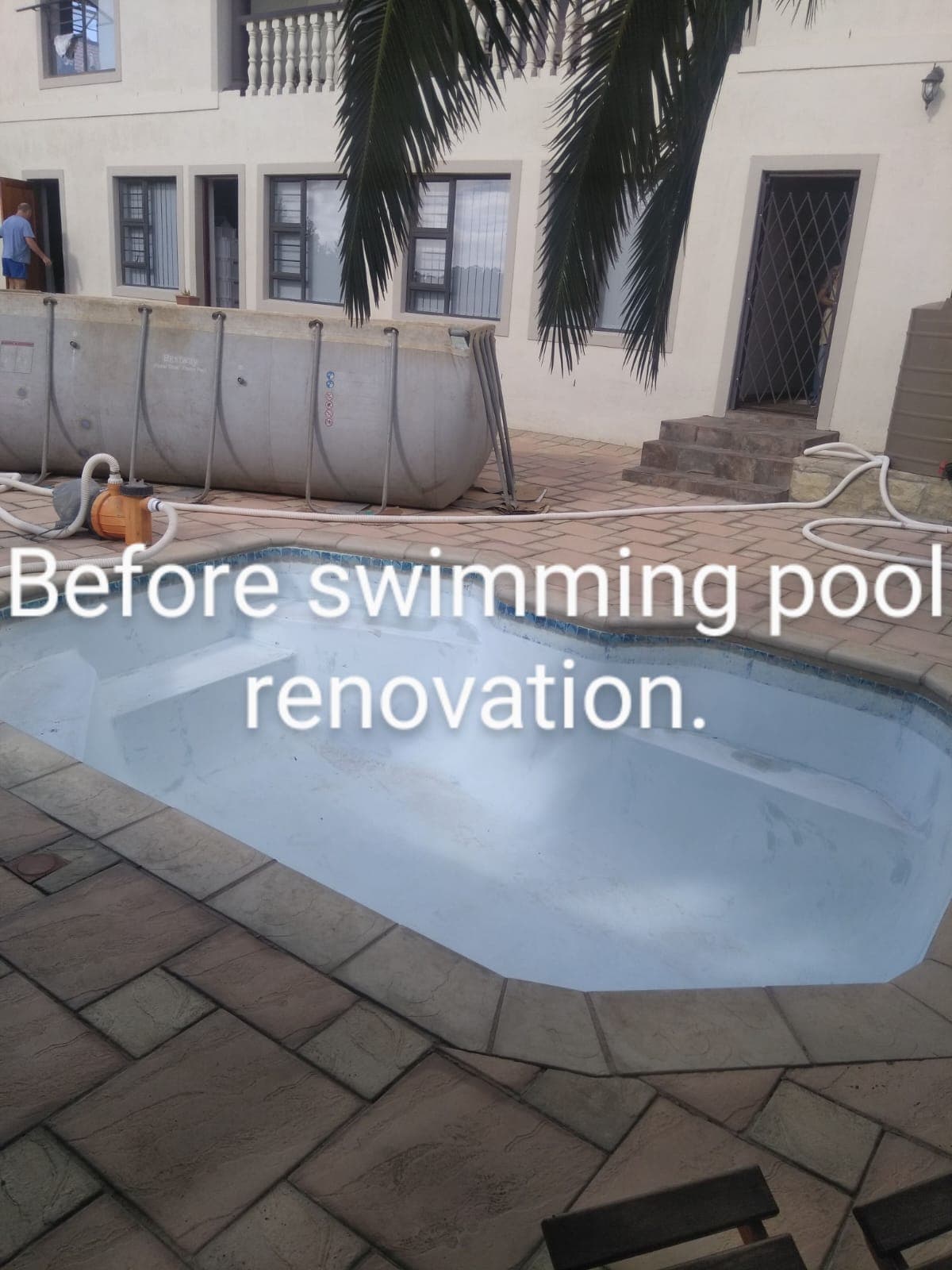 Faded, stained pool shell before renovation by Bruce Handyman