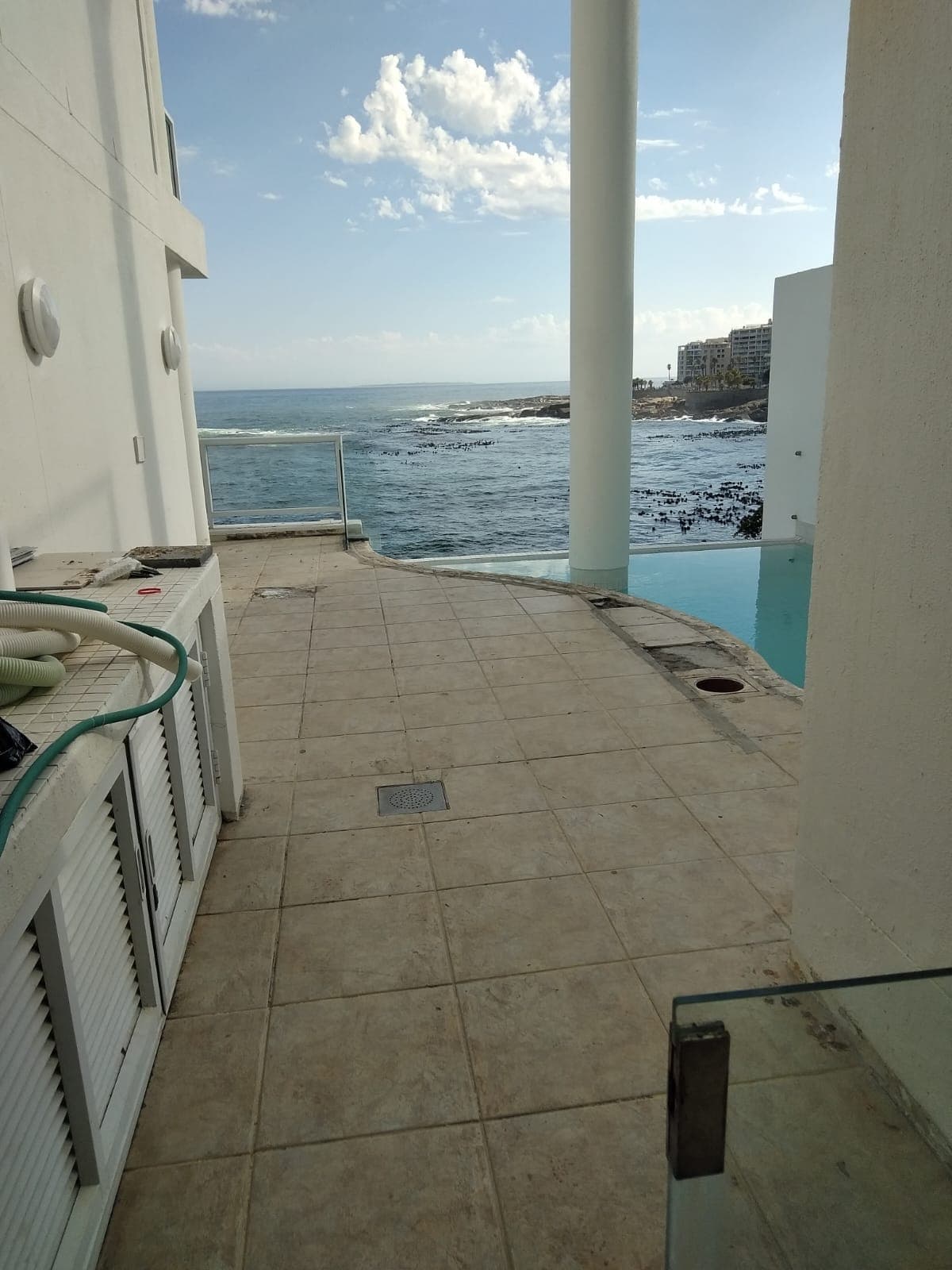 Oceanfront terrace pool cared for by Bruce Handyman