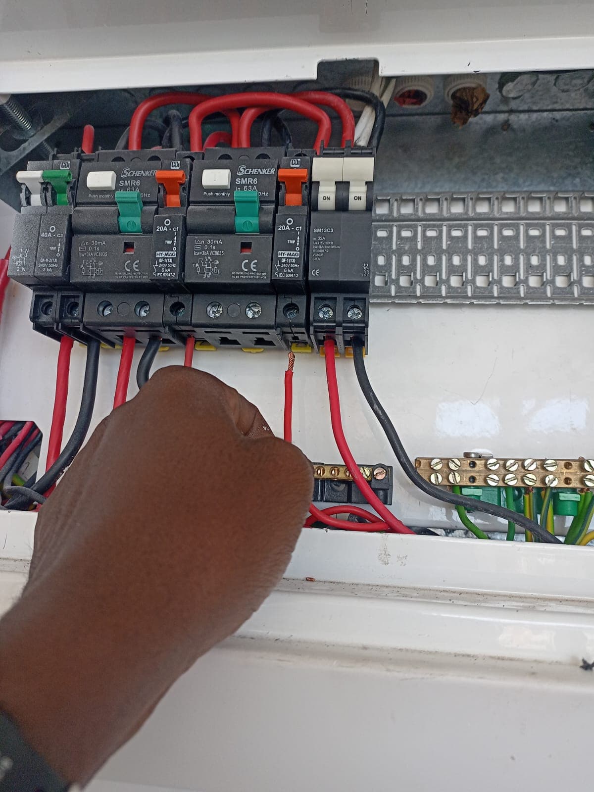 Neatly wired distribution board serviced by Bruce Handyman
